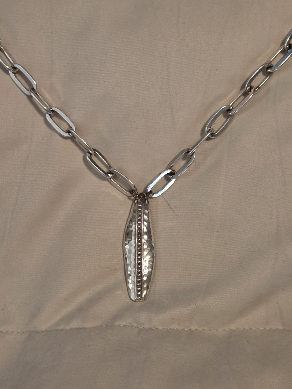 Brighton hammered silver necklace and earring set.